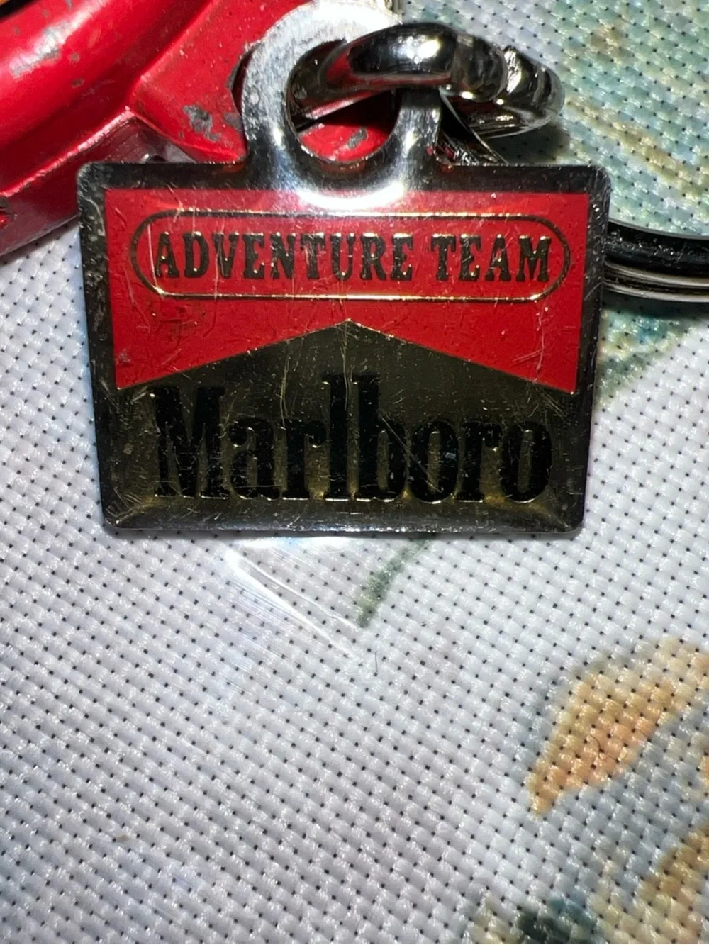 Marlboro Red and Black lizard Adventure Team Keychain Tag